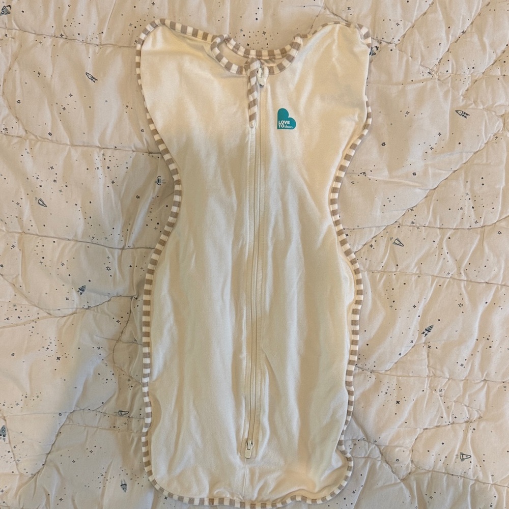 Love to Dream Cream Baby Swaddle with Striped Trim Size Newborn